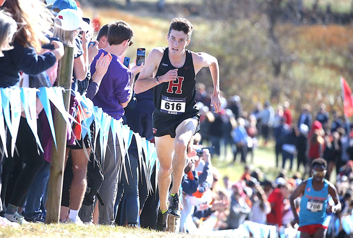 Runner competing in a cross-country race.